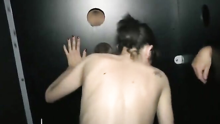 A young smoking brunette sucks cocks in gloryhole and gets sodomized and cum covered in gangbang in a swinger club (2025 | SD)