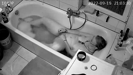 Cam catches milf masterbating in the tub while video chatting (2026 | SD)