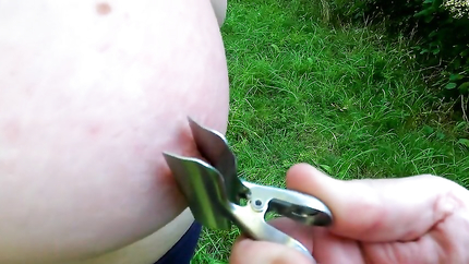 Clamps on nipples and whipping her tits in the woods (2026 | SD)
