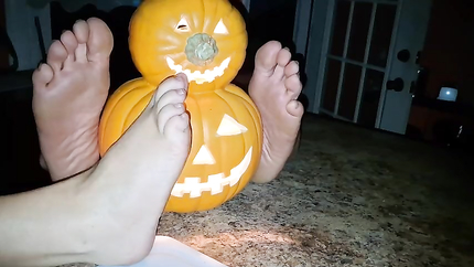 Showing off our soles next to the pumpkin (2026 | SD)